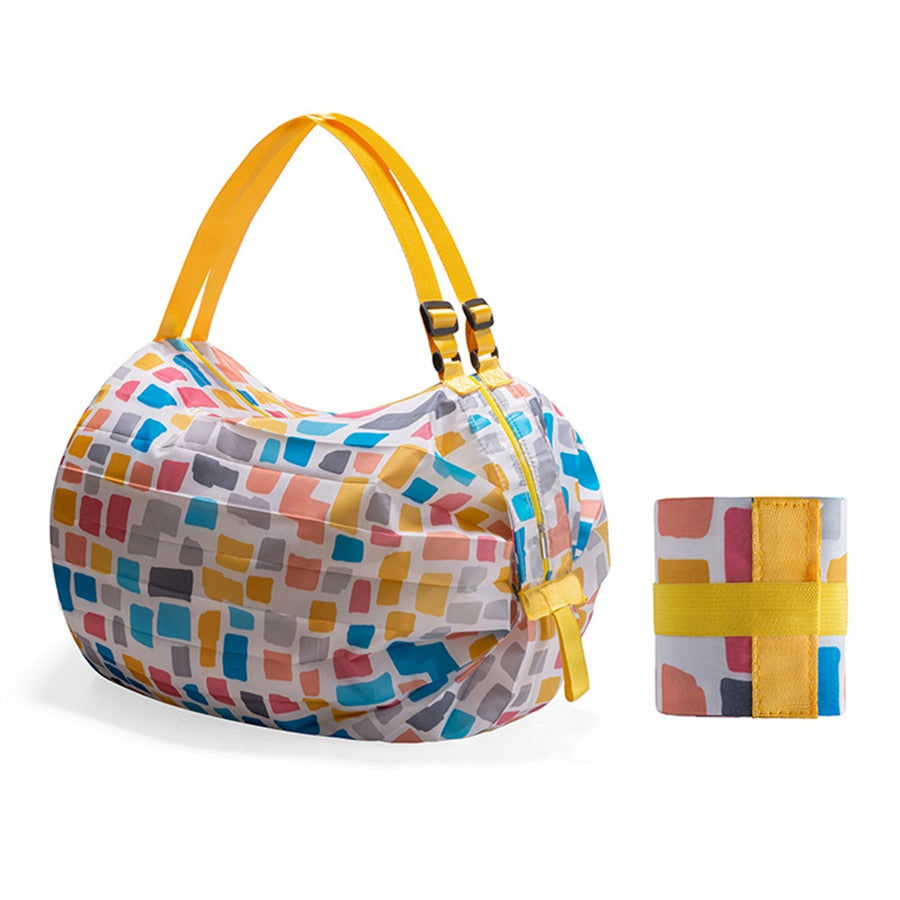Women's foldable large capacity shopping tote, reusable & durable oxford fabric for groceries or travel.