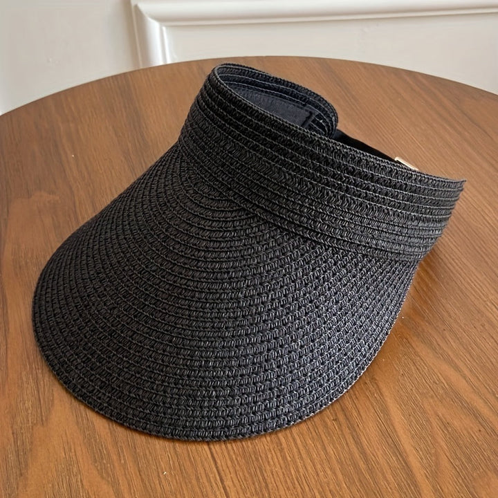 Stylish wide brim sun visor for women, ideal beachwear & summer accessory with UV protection.