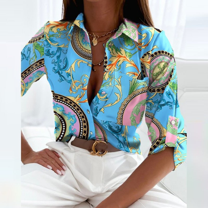 Casual yet chic women's geometric print blouse, long sleeve, versatile fashion top.
