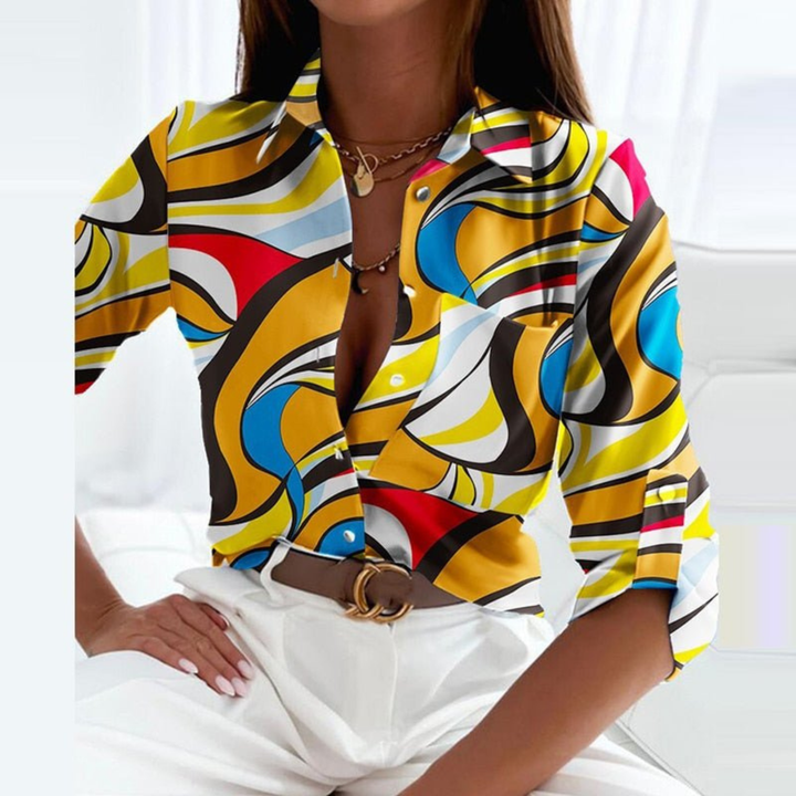 Stylish women's geometric print long sleeve top, versatile button-down blouse.