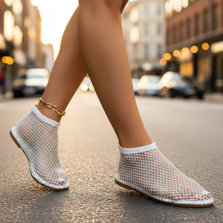 Elegant women's flats, secure instep strap, sparkling with glitter and rhinestones.