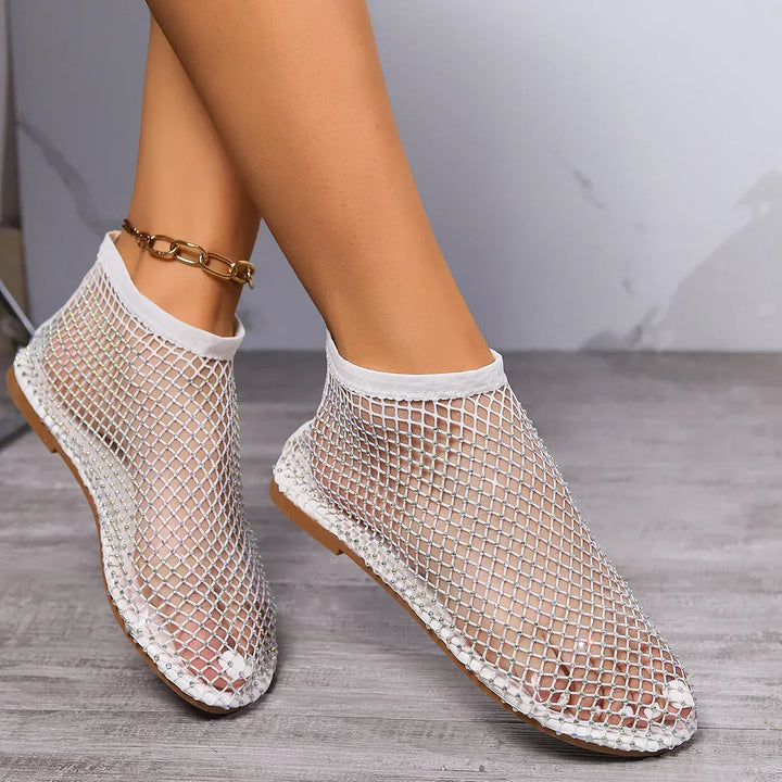 Casual or dressy women's glitter rhinestone flats with a secure and comfortable instep strap.