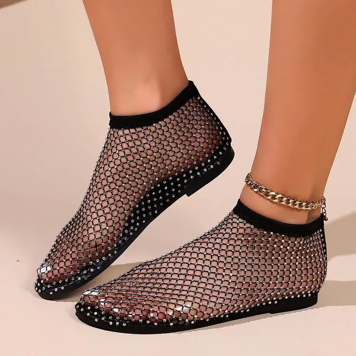 Glamorous rhinestone flats for women, secure strap, perfect for dressy or casual wear.