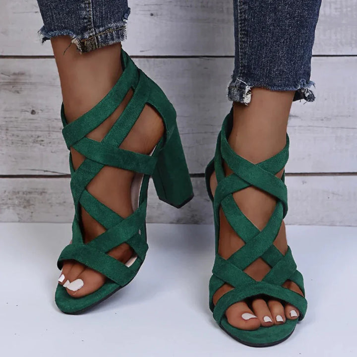 Stylish women's black block heel strappy sandals, versatile fashion for any occasion