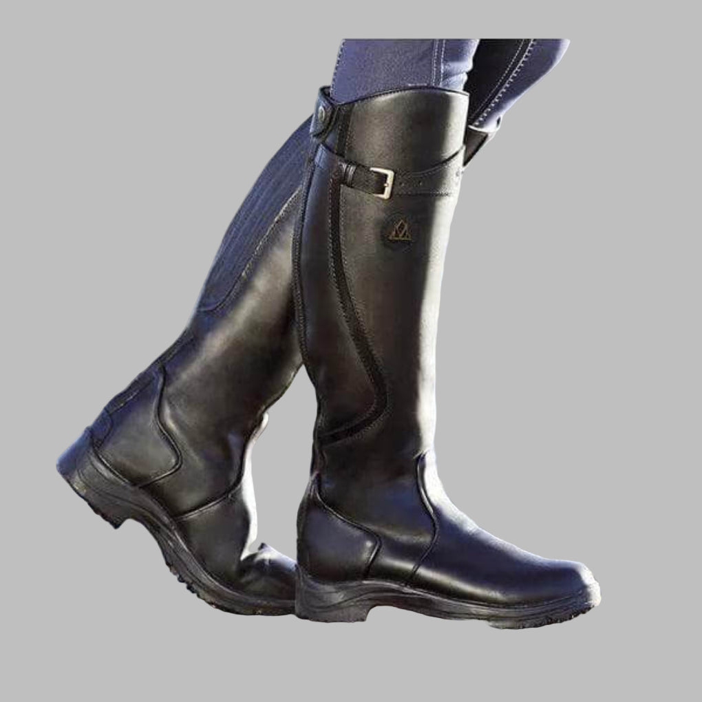 Comfortable women's riding boots for equestrian activities, featuring grip-tread soles for stability & safety.