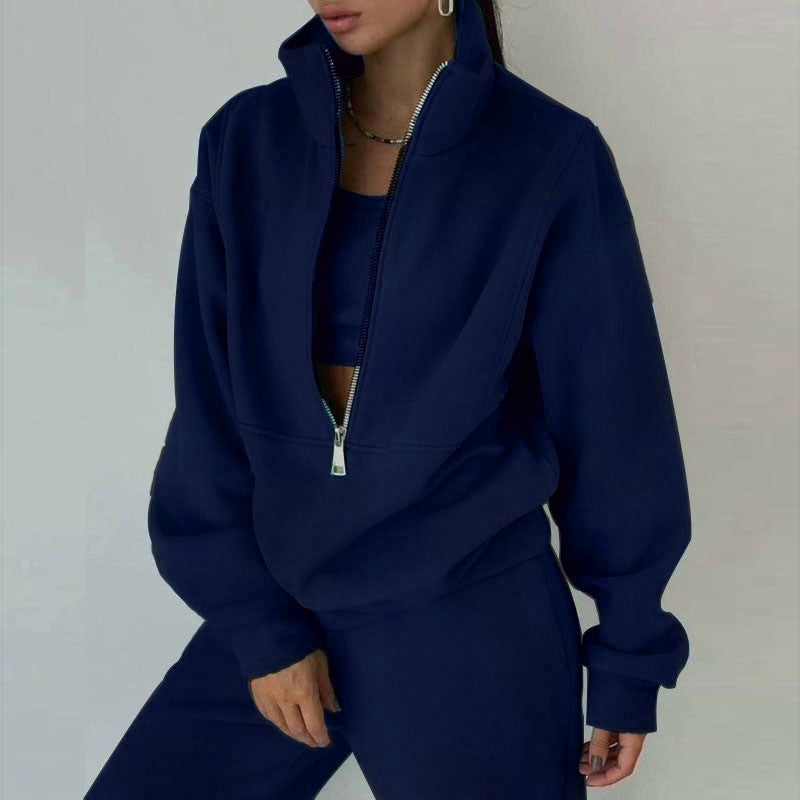 Women's complete half-zip sweatsuit. High-waist joggers & pullover for ultimate comfort, travel, & casual style.