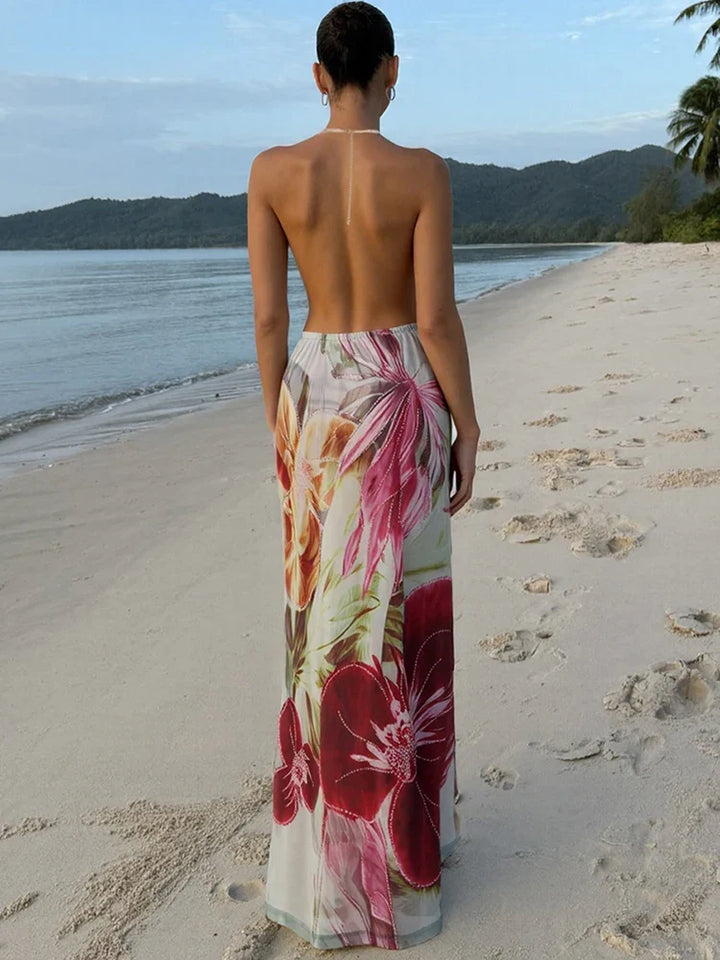 Graceful floral maxi dress, women's halter neck, perfect for parties and wedding guest attire.