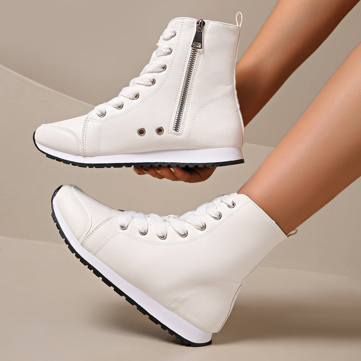 Women's high-top orthopedic sneakers: wide toe box, cushioned sole, and arch support for maximum comfort.