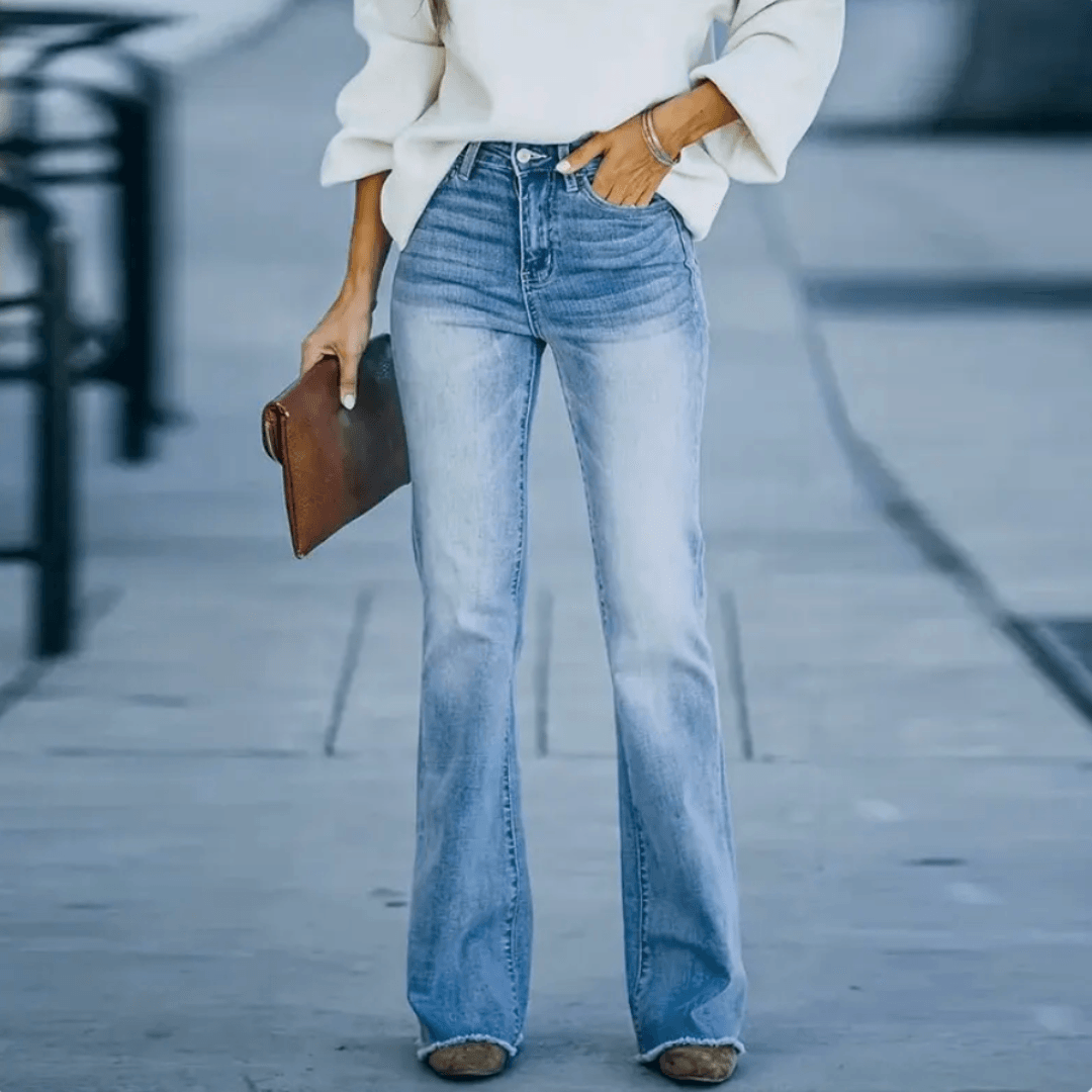Women's high-waist straight leg jeans in classic blue denim, perfect for spring casual wear.