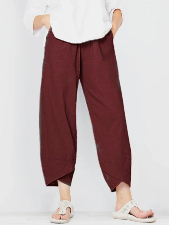 Trendy high-waist wide leg cropped pants for women, featuring a stylish tulip hem.