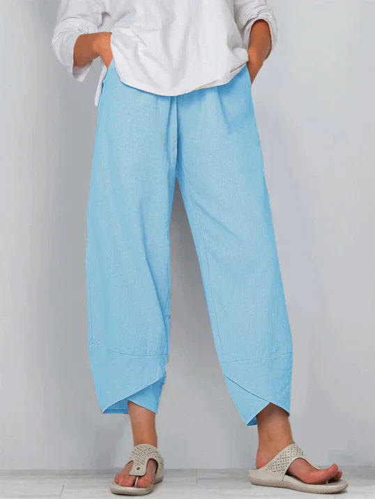 Elegant wide leg high-waist summer pants for women, with a beautiful tulip hem detail.