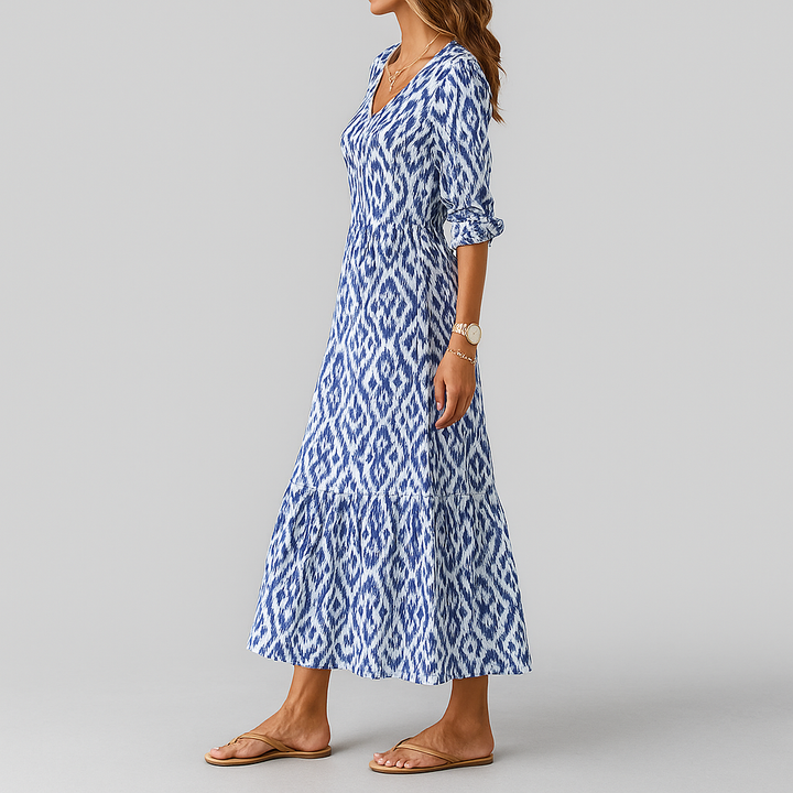 Flowy women's ikat print maxi dress, relaxed fit & V-neck. Ideal for spring casual wear or summer bohemian style.