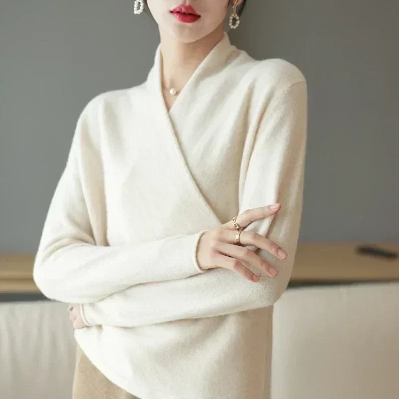 Close-up of knit fabric on women's wrap neck spring top, soft and versatile apparel