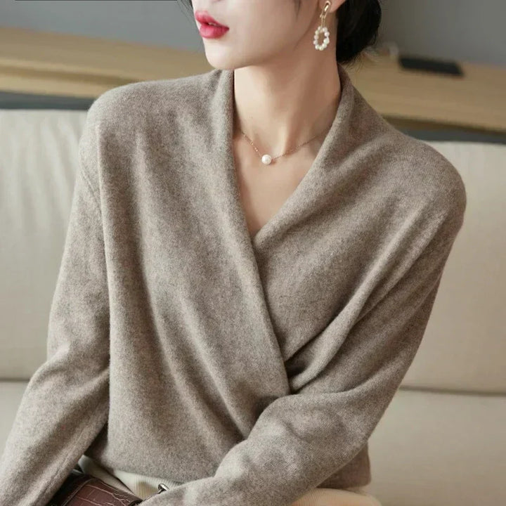 Full shot of the women's knit wrap neck spring top, showcasing its versatile silhouette