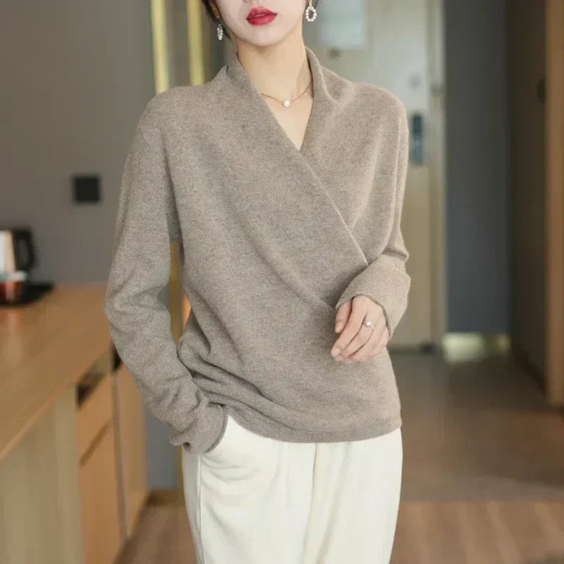 Stylish women's apparel: long sleeve knit top with a trendy wrap neck, spring essential