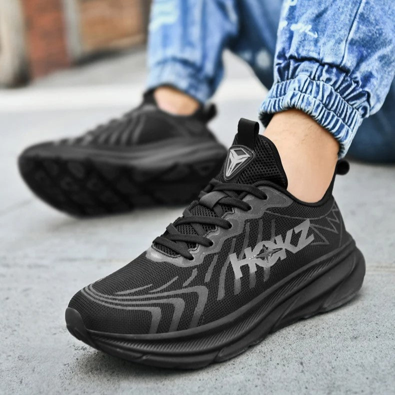 Sporty women's athletic running shoes, lace-up design with a comfortable chunky sole for various training activities.
