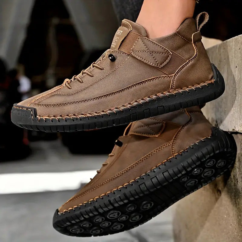 Stylish women's flat sneakers, lace-up design with intricate decorative stitching for a chic, casual fit.