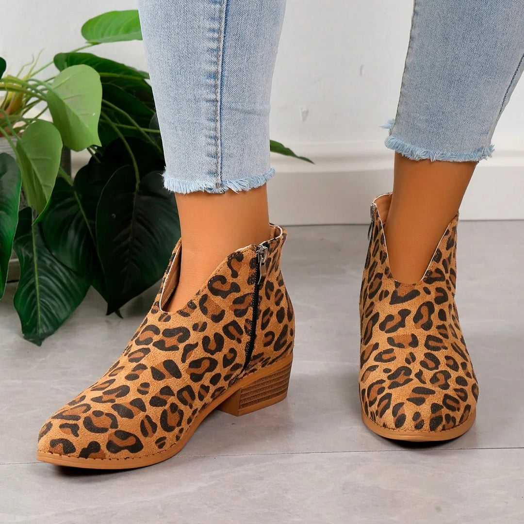 Women's leopard print ankle boots, stylish and fashionable, with a functional side zipper closure.