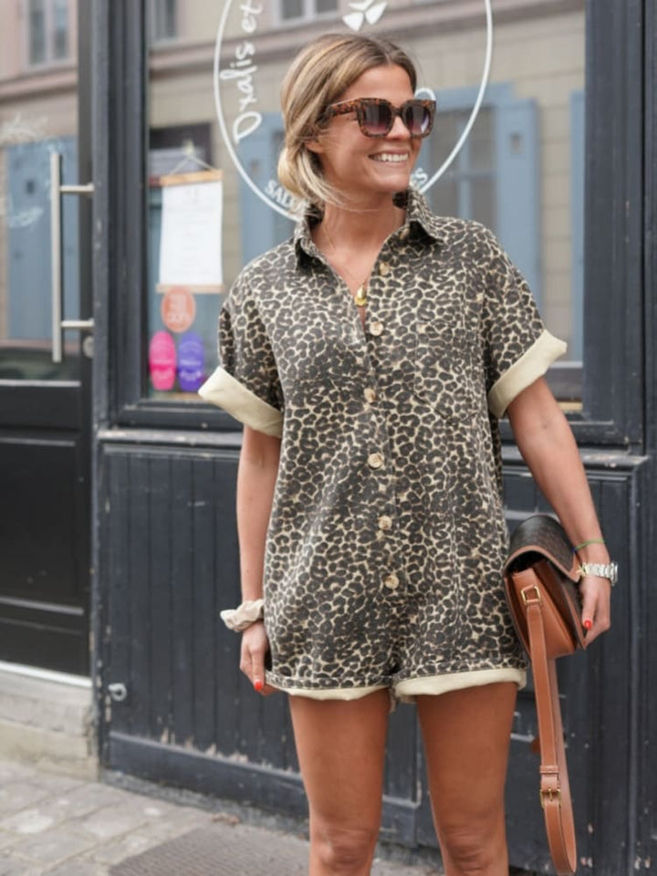 Stylish women's one-piece leopard print romper with buttons, ideal for casual summer outfits