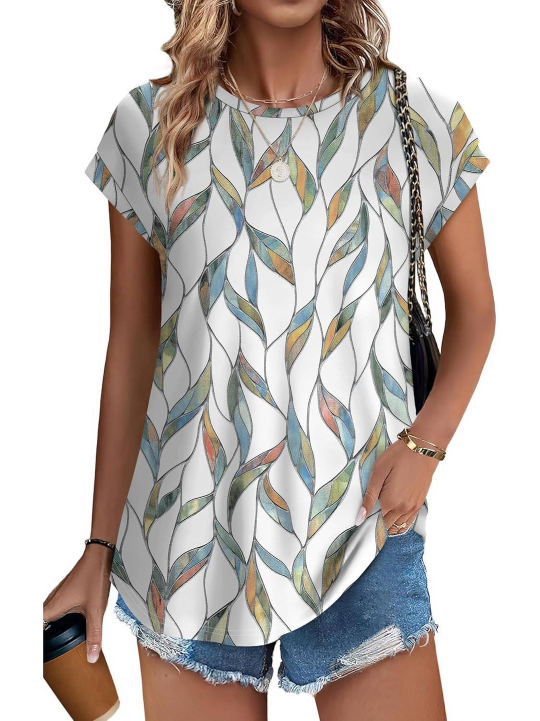 Women's lightweight botanical leaf print cap sleeve top. Perfect for summer casual wear.