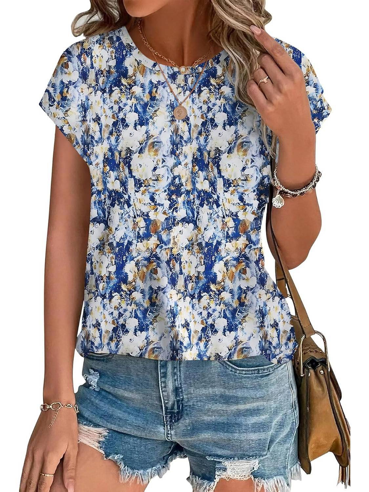 Women's lightweight botanical leaf print top. Cap sleeves & crew neck make it a summer casual favorite.