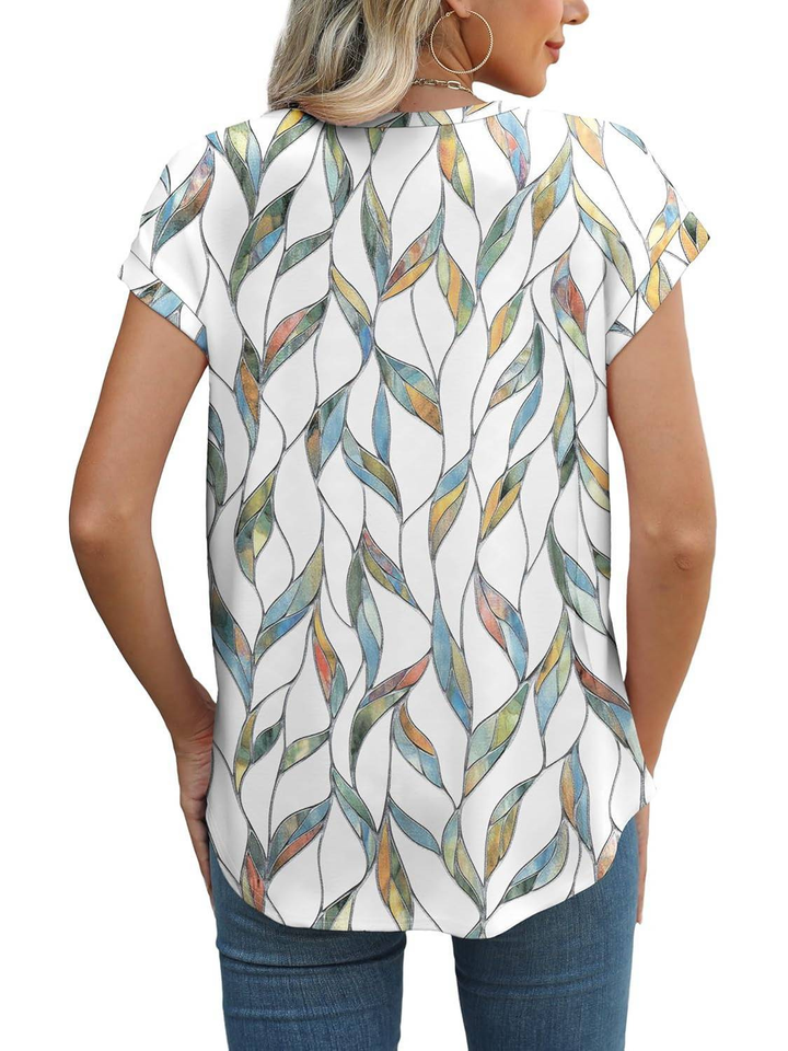 Comfortable lightweight women's cap sleeve top. Features a fresh botanical leaf print, ideal for casual summer.