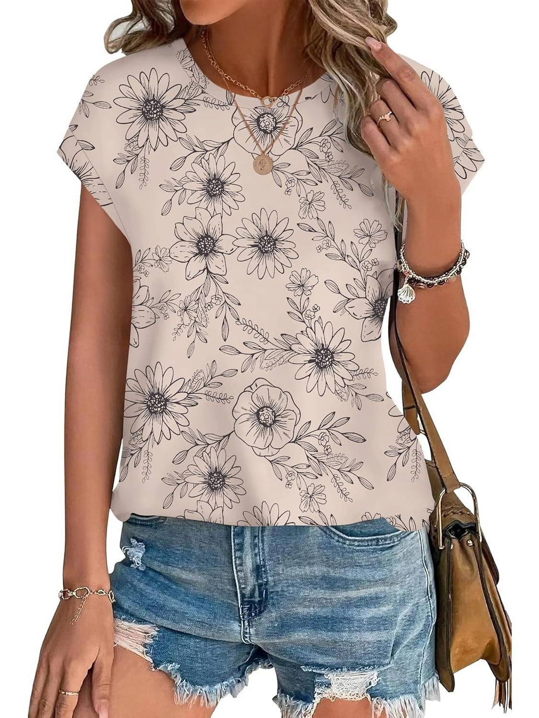 Casual women's lightweight cap sleeve top featuring a beautiful botanical leaf print. Summer essential.