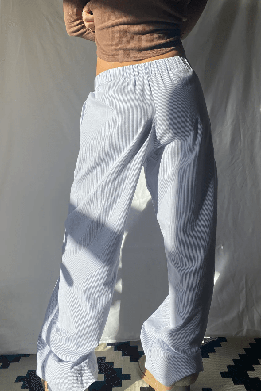 Everyday women's apparel: relaxed fit lounge trousers, lightweight & comfortable with a soft fabric and elastic waist.