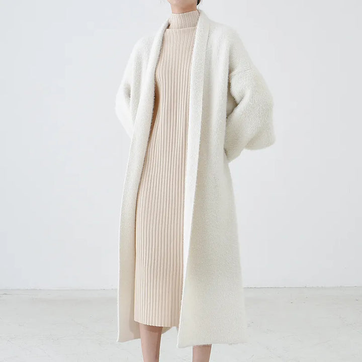 Women's lightweight open front longline cardigan in black, perfect for spring layering.