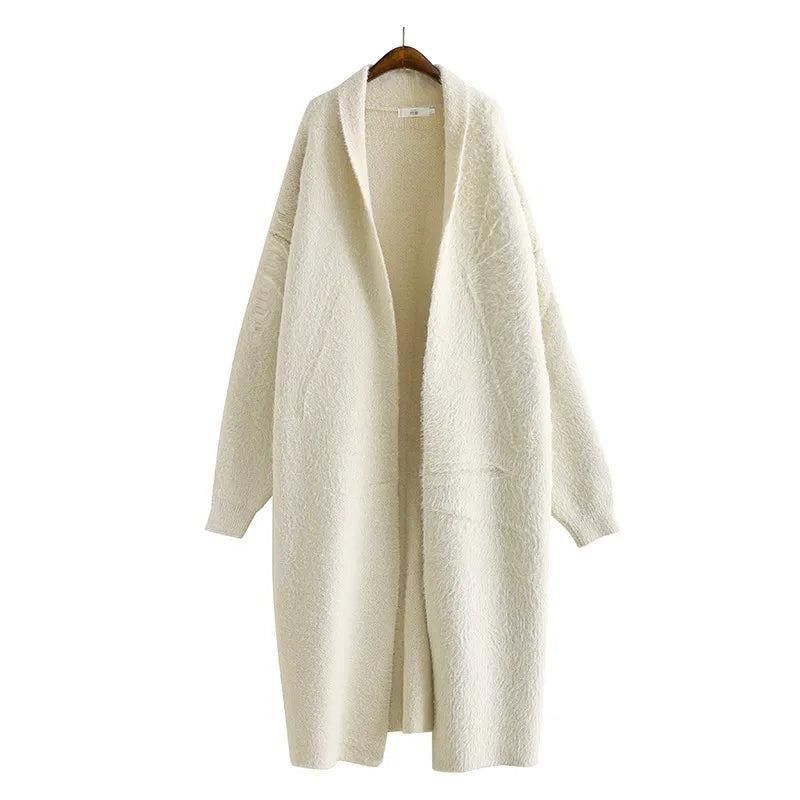 Elegant women's open front cardigan, a versatile lightweight layering piece for casual wear.