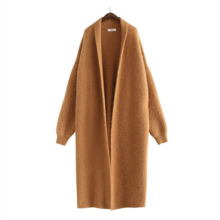 Stylish women's longline cardigan, open front design in a soft, lightweight fabric for spring.