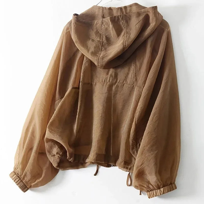 Full zip women's lightweight hoodie, perfect for summer UV protection. Casual outdoor layering piece.