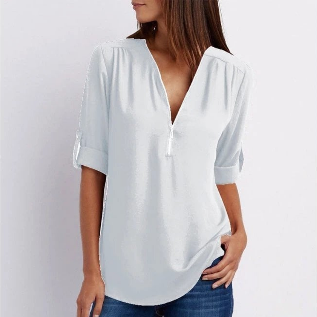 Versatile women's V-neck blouse with zip front. Ideal for workwear, spring, or comfortable summer style.