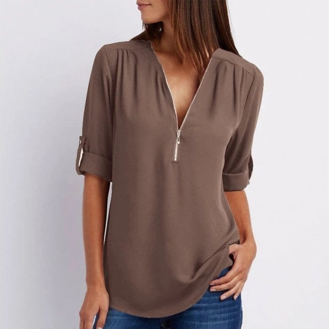 Zip-front V-neck women's blouse with roll-sleeves. Lightweight & versatile, suitable for casual or work outfits.