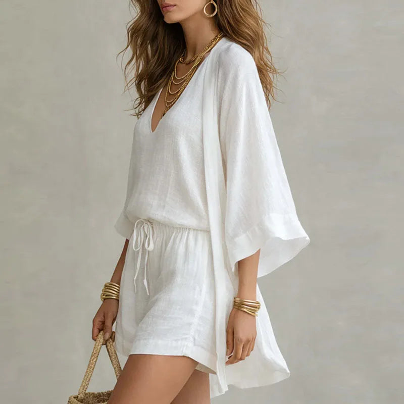 Relaxed fit women's linen blend shorts set in beige, ideal for casual summer beachwear. Comfortable & stylish.