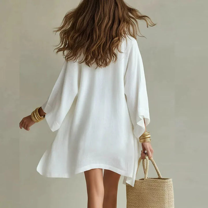 Stylish women's 3-piece linen blend shorts set with a sleeveless tank top, high-waist shorts, & light shirt.