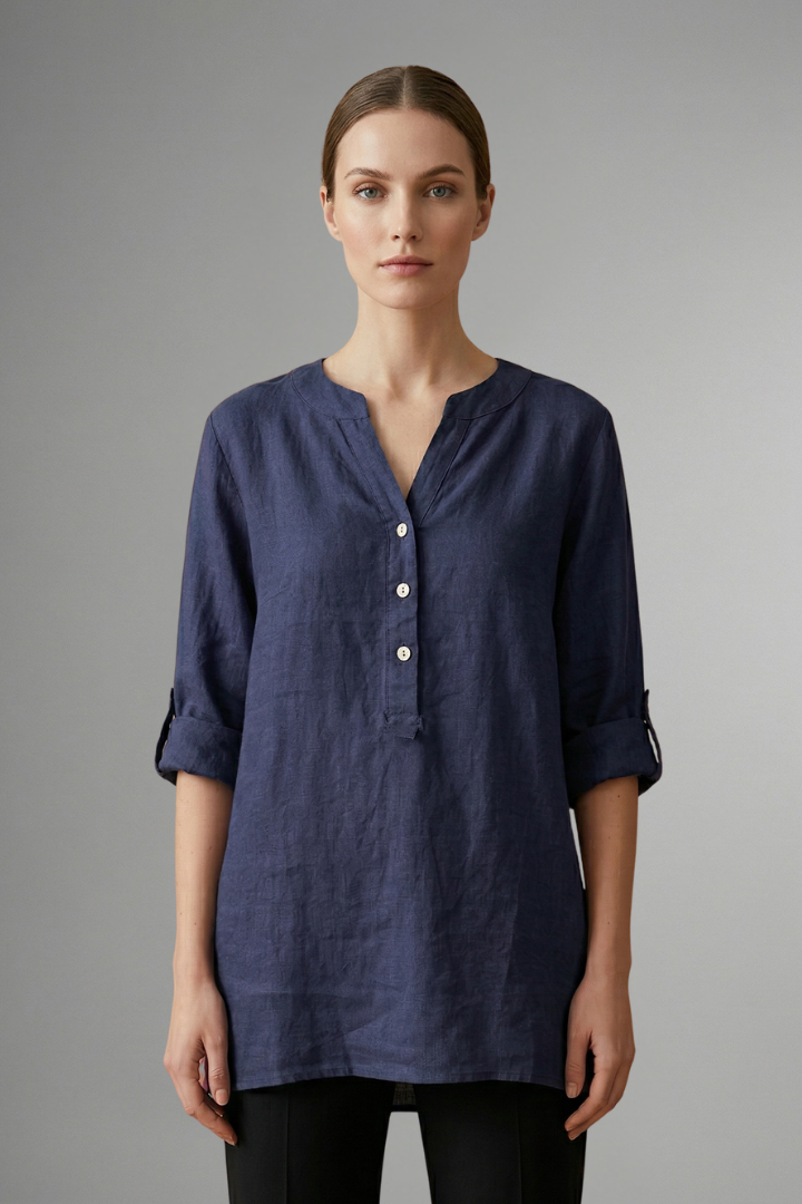 Women's button-front linen blouse with roll-up sleeves. Loose fit V-neck top, great for summer comfort.