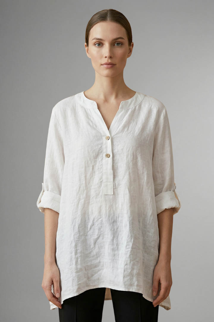 Versatile women's linen blouse, button-front with roll-up sleeves. Loose fit V-neck shirt for seasonal style.
