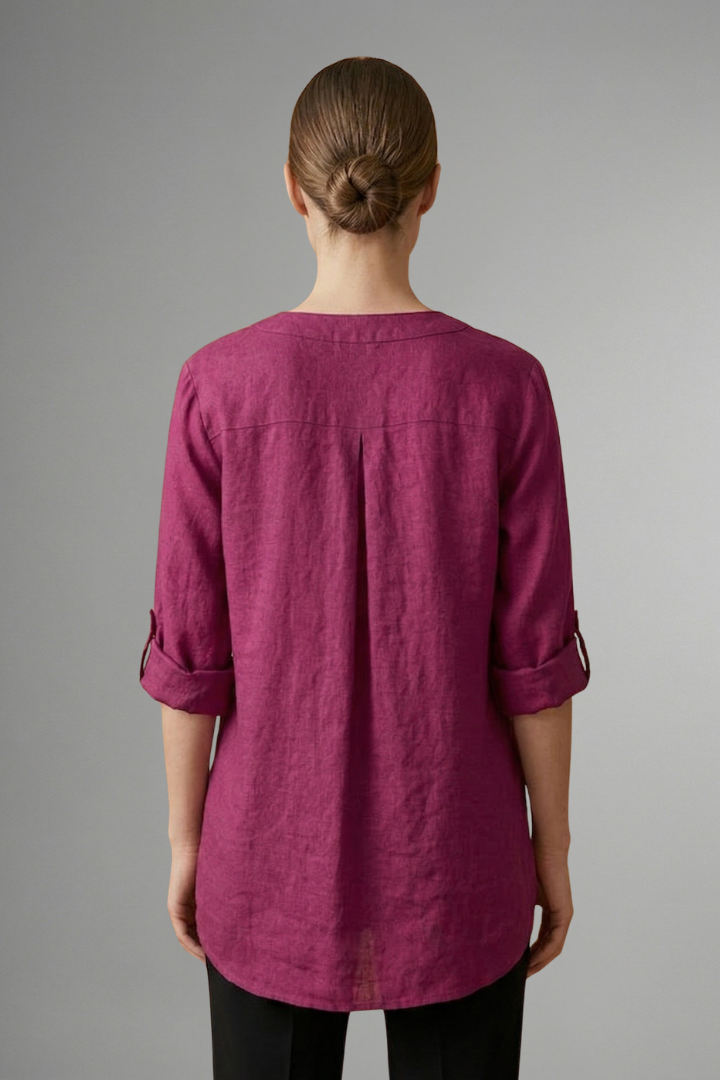 Effortless women's loose fit linen blouse, button-front with roll-up sleeves. Comfortable casual top.