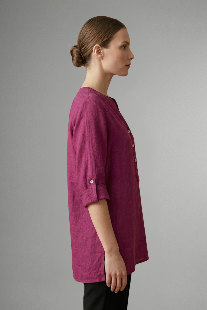 Plus size women's linen button-front blouse, roll-up sleeves & V-neck. Versatile for casual & workwear.