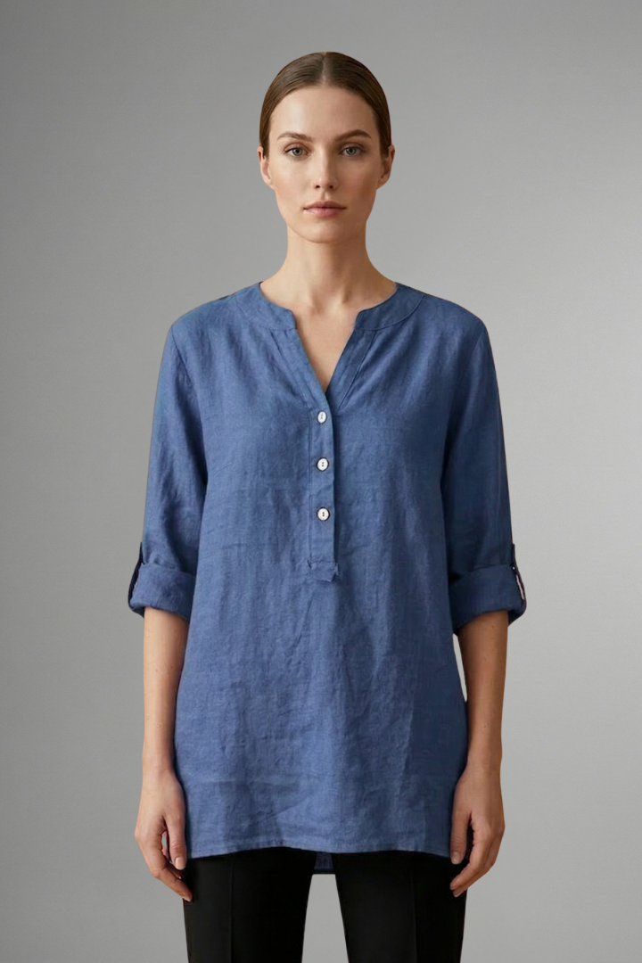 Fashionable women's linen blouse, button-front with roll-up sleeves. Ideal for spring casual ensembles.
