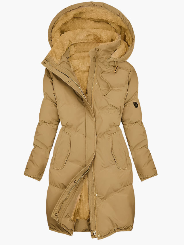 Stylish women's long quilted hooded winter coat, side view, ideal for extreme cold, warm jacket