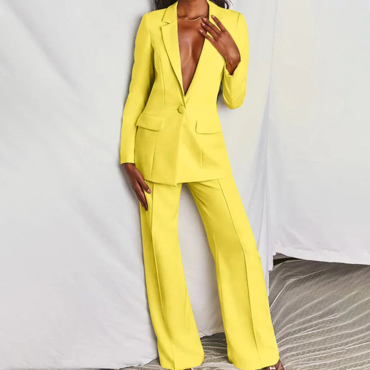 Women's longline blazer and wide-leg pants suit. Chic, tailored, perfect for professional wear.