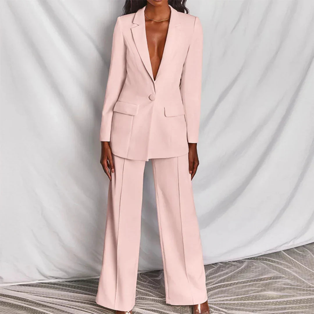 Empowering women's power suit: longline blazer & wide-leg pants set. Professional and chic office wear.