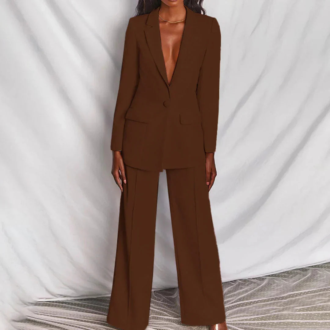 Stylish women's blazer set featuring a longline blazer and flattering wide-leg tailored pants.