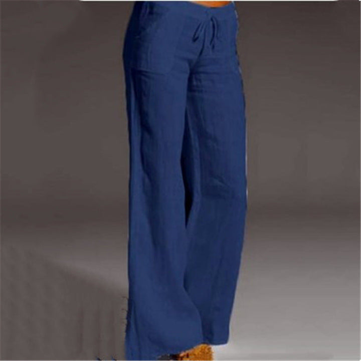 Stylish women's linen trousers with elastic waist for ultimate comfort. Loose fit makes them ideal for summer & travel.