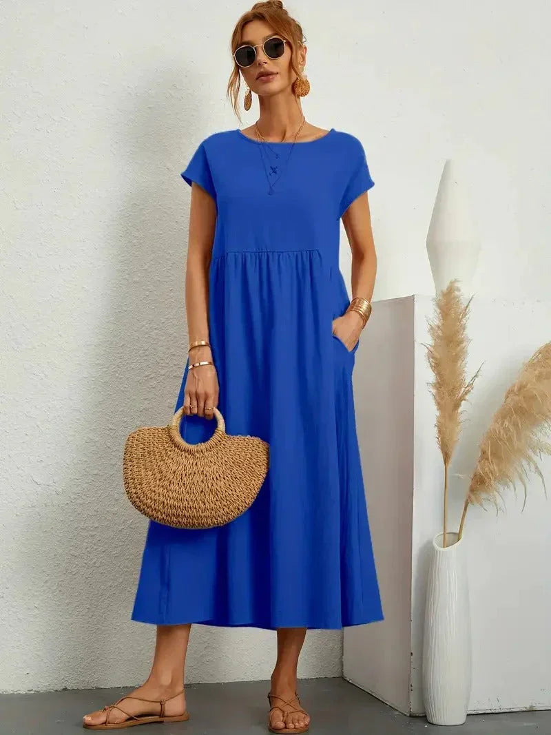 Comfortable women's casual maxi dress, loose fit, short sleeve, round neck, with practical pockets.