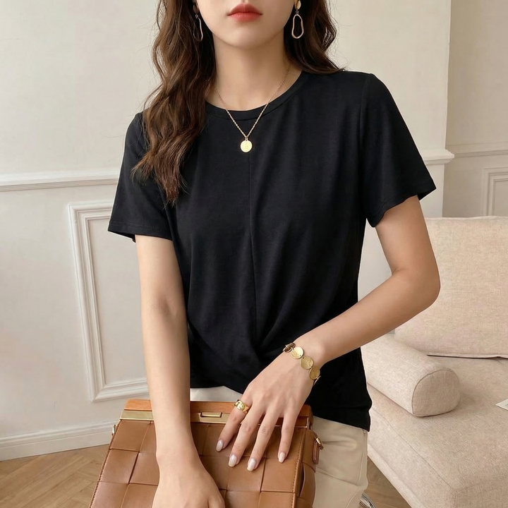 Pink Women's Luna Twist Front Tee with a stylish twist detail. Comfortable relaxed fit short sleeve top.