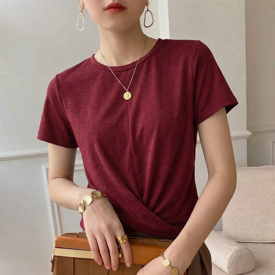 White Women's Luna Twist Front Tee. Casual short sleeve women's top with a unique twist front design.