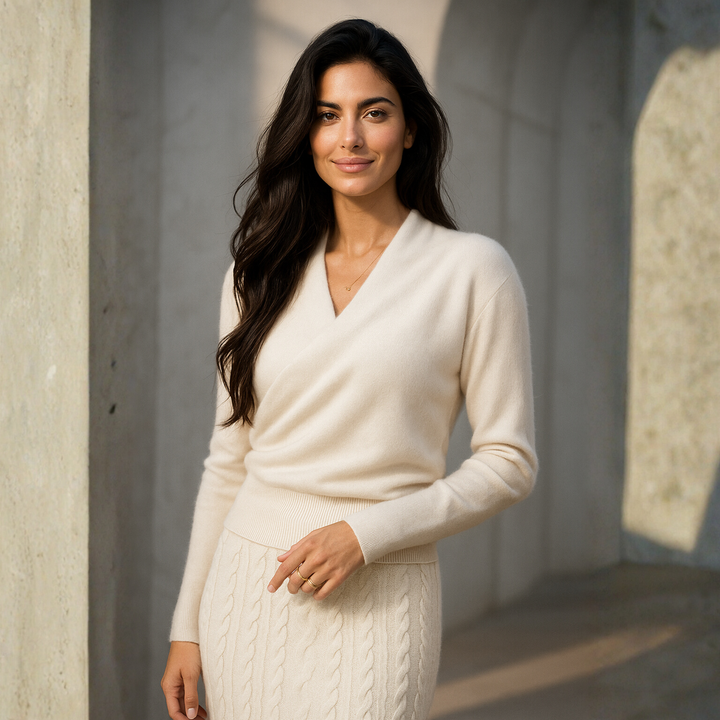 Detail of the hemline on the Women's Luxe Cashmere Knit Crossover Sweater, an elegant women's top